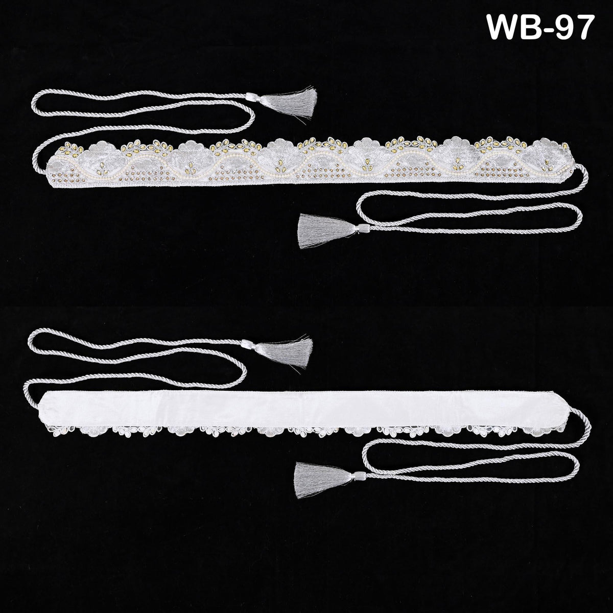 two white decorative headbands with tassels, displayed against a black background.