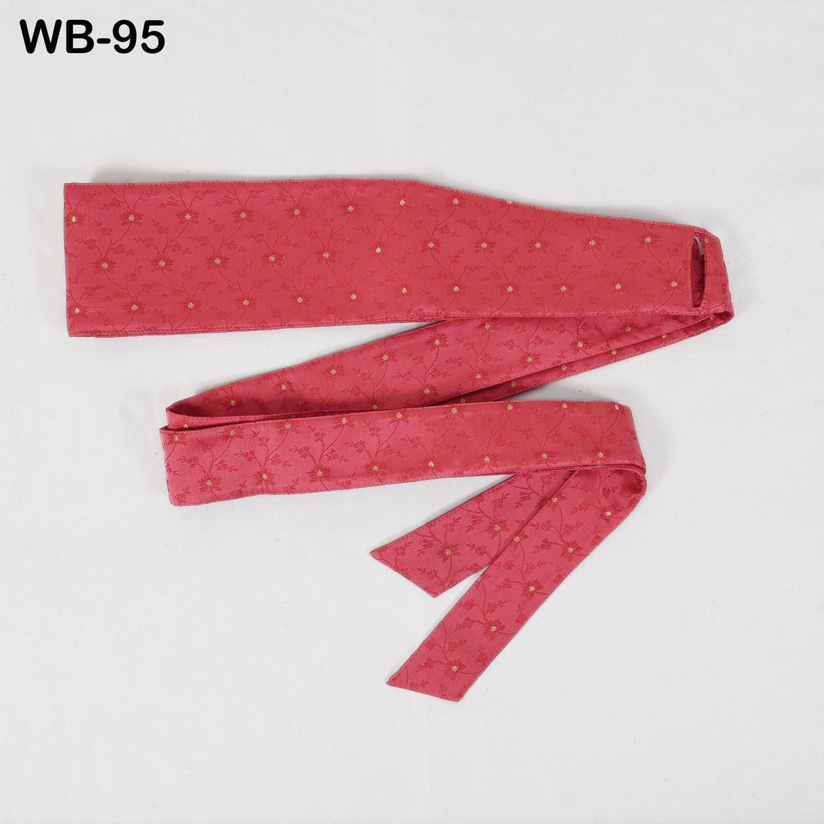 A red tie with a floral pattern is shown against a white background.