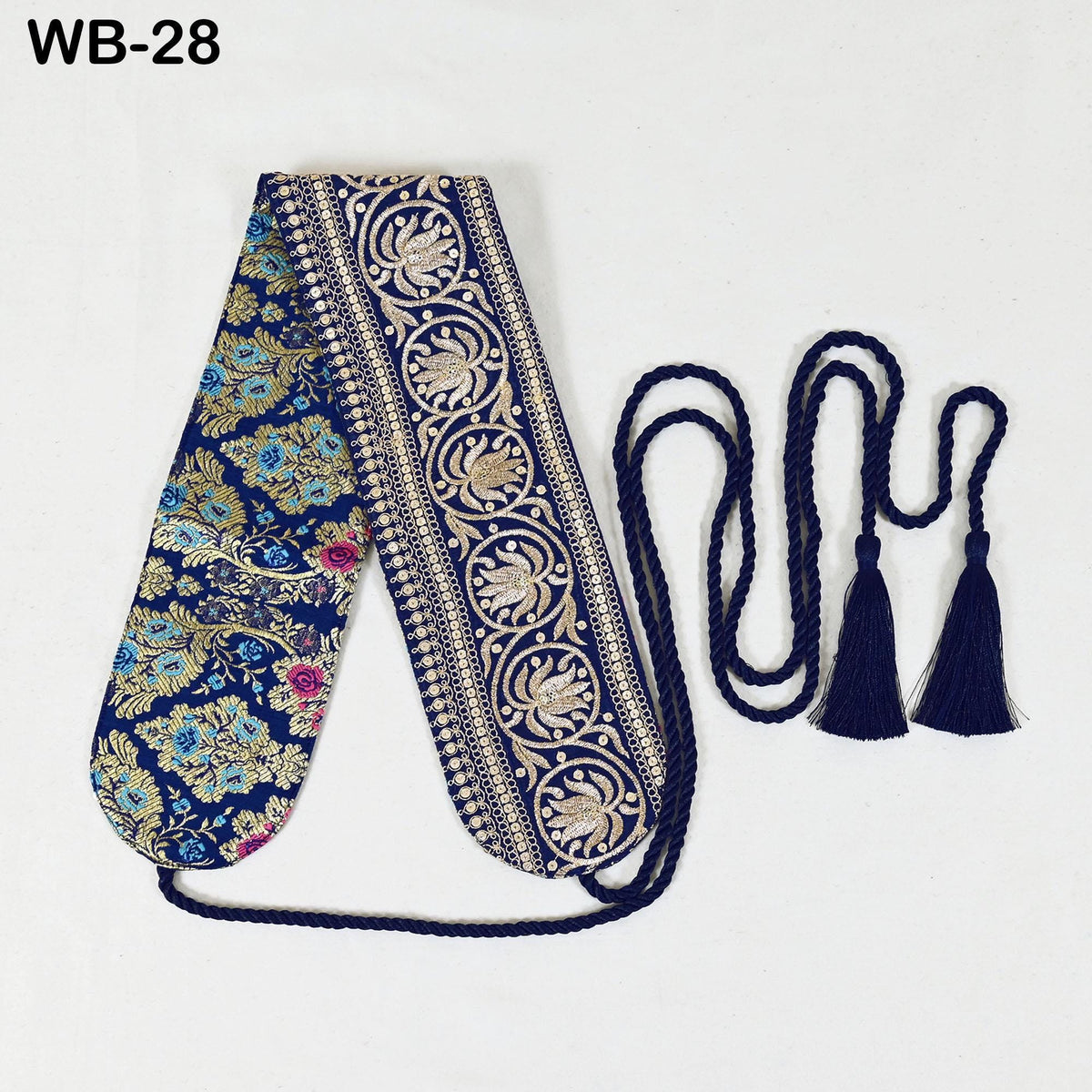 a decorative blue and gold scarf with a floral pattern, and a pair of blue tassels hanging from the ends of the scarf.