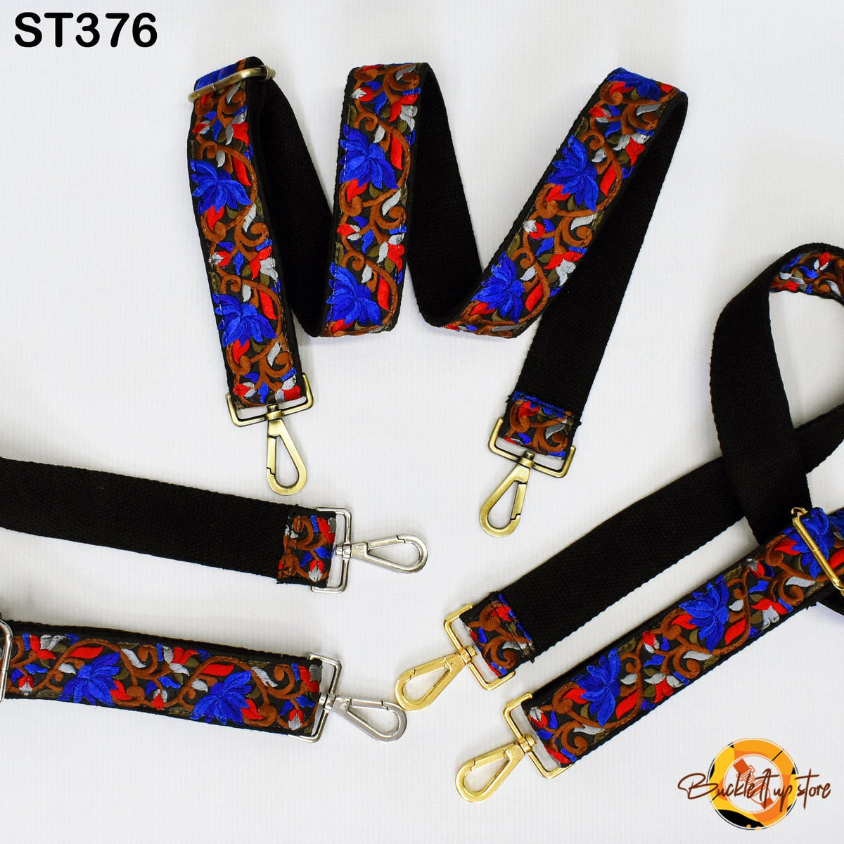 a collection of colorful, patterned straps with gold hardware, arranged on a white background.