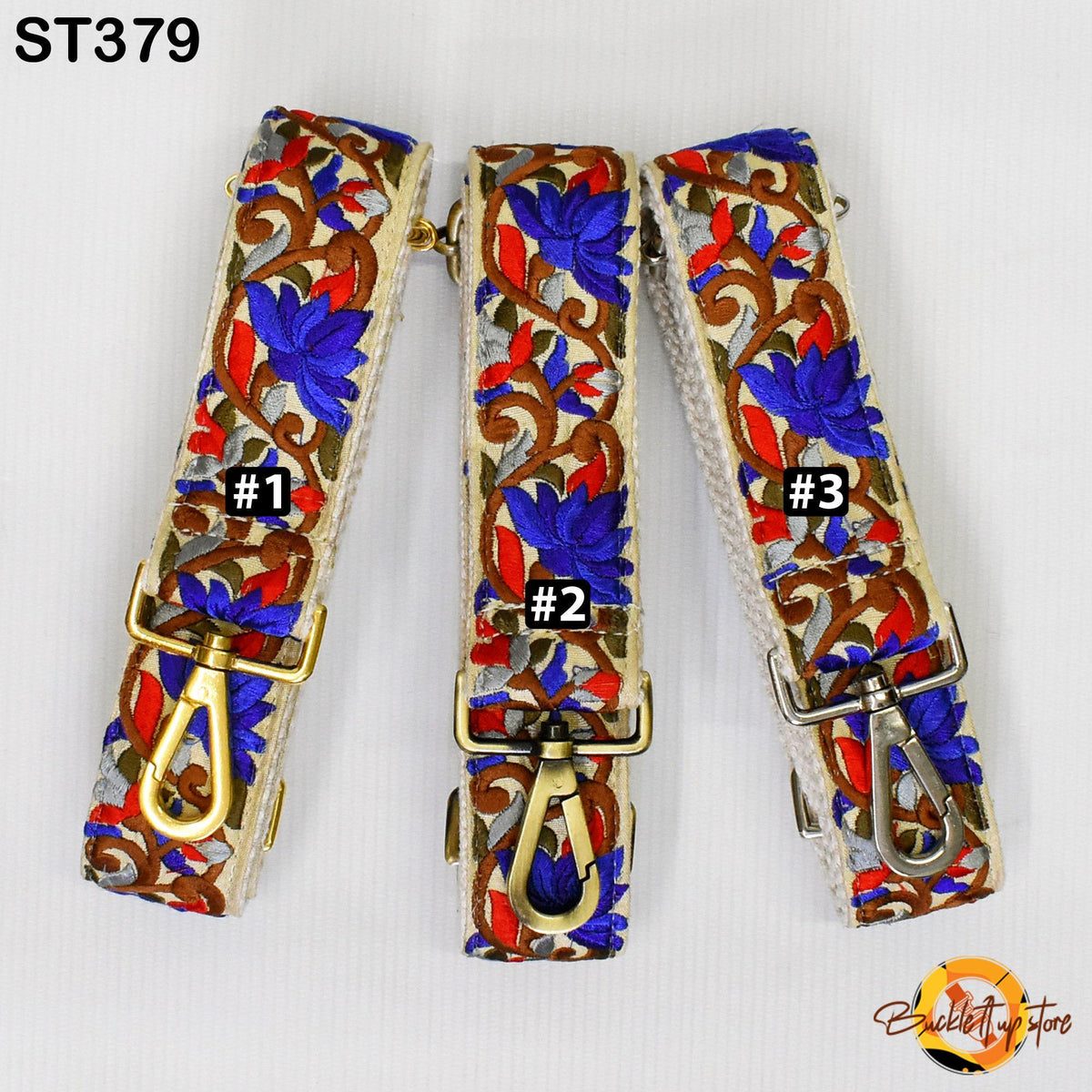 Three colorful straps with floral patterns, each with a metal clasp and hook.
