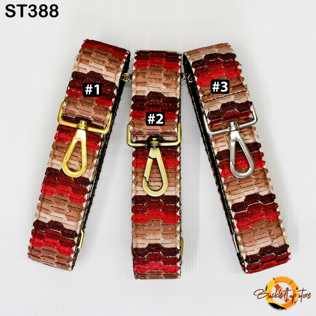 Three colorful straps with different patterns and numbers on them, arranged in a row.