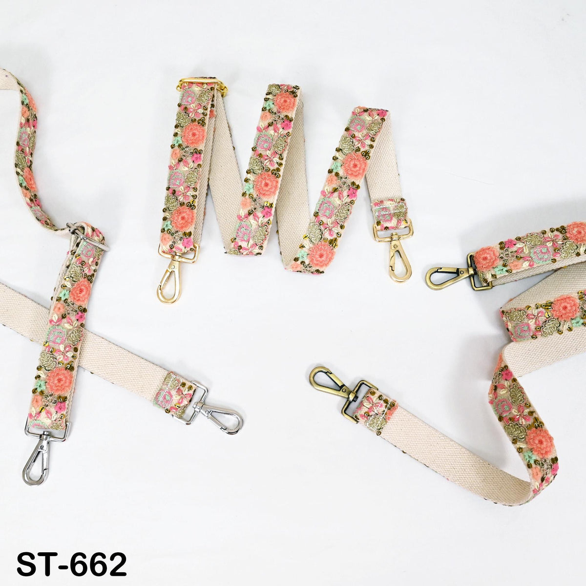 a collection of beige straps with floral patterns, arranged on a white background.