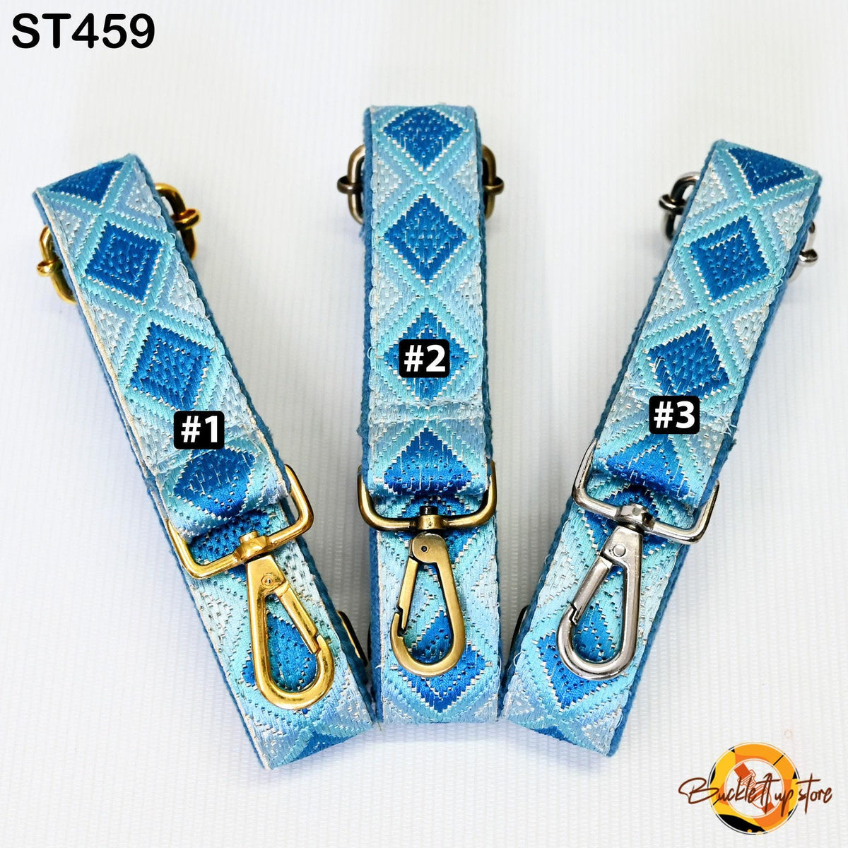 Three blue and gold patterned straps with metal hooks, each labeled with a number.