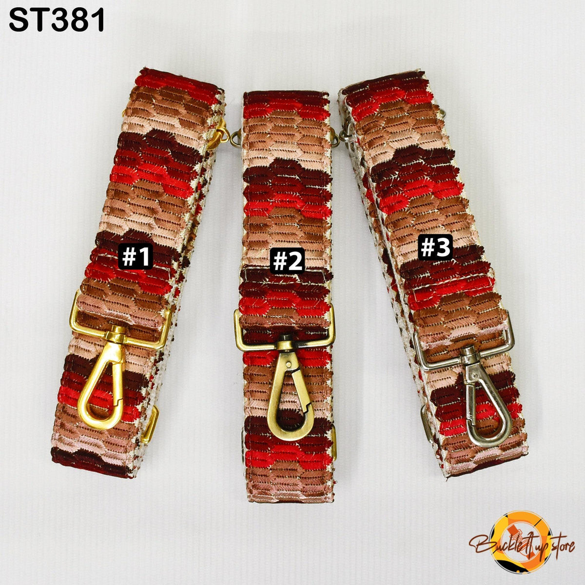 Three colorful straps with different patterns and numbers, likely representing different sizes or styles.
