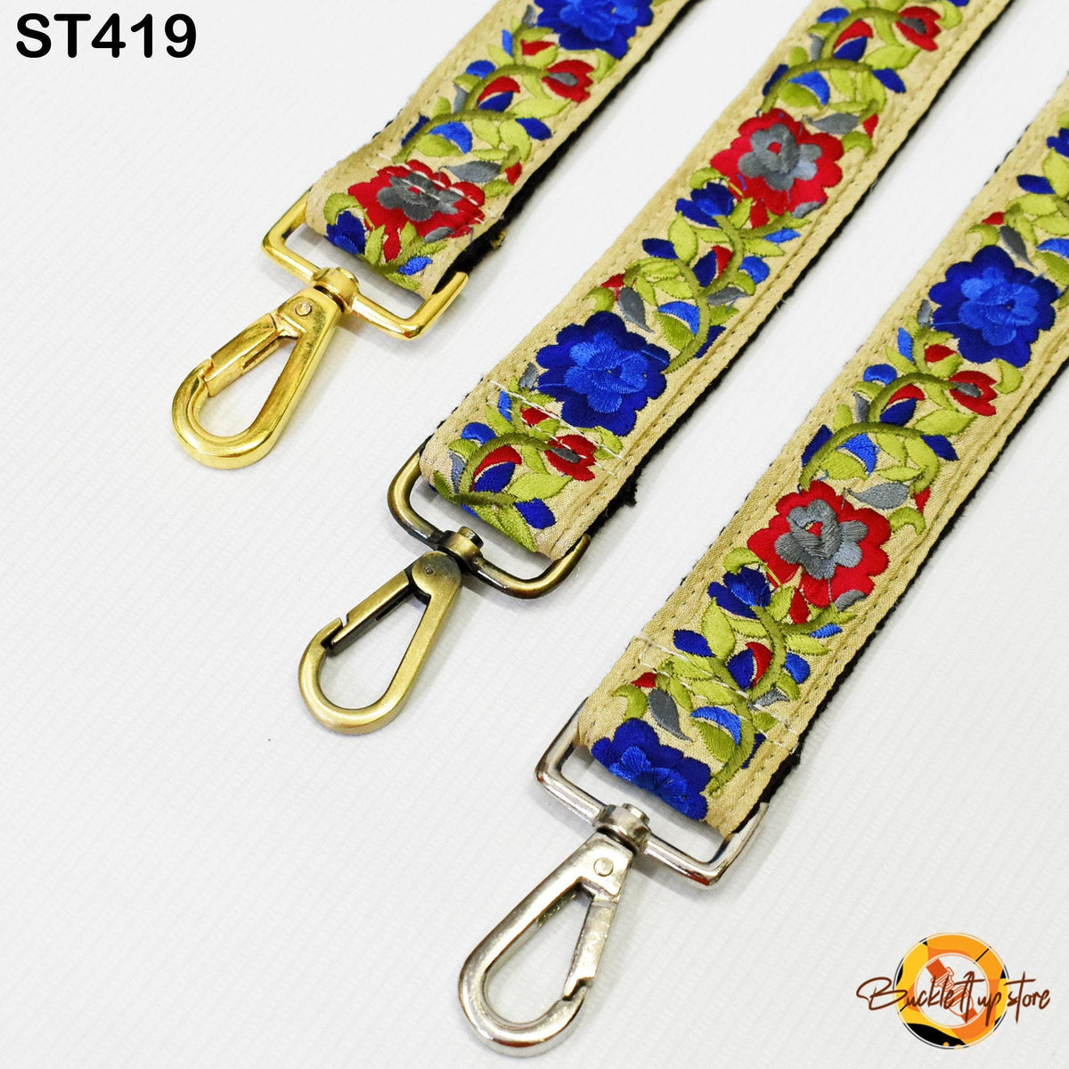 three colorful straps with floral patterns, each featuring a metal clasp and hook.
