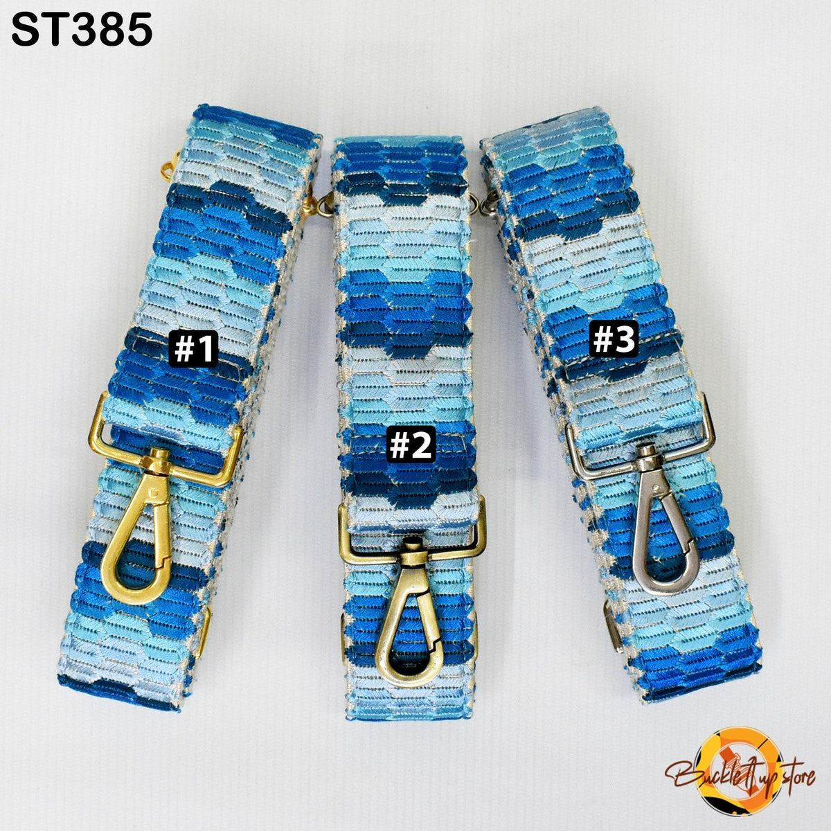 Three blue and white patterned straps with gold hooks, each labeled with a number.