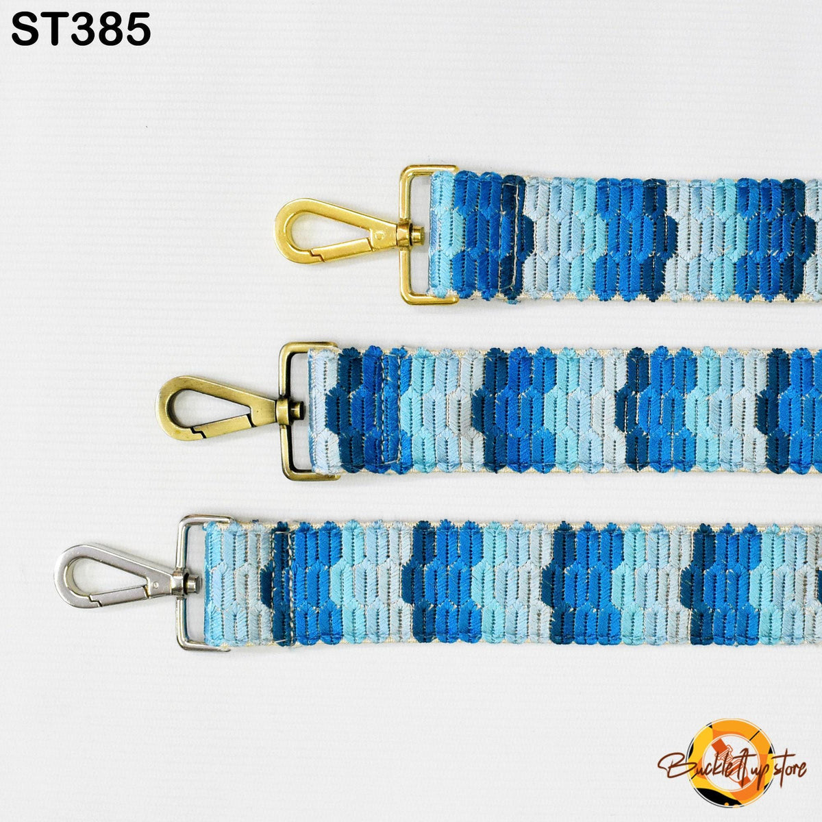 three different straps with a blue and white striped pattern. Each strap has a metal clasp and a metal loop, and they are arranged in a row against a white background.
