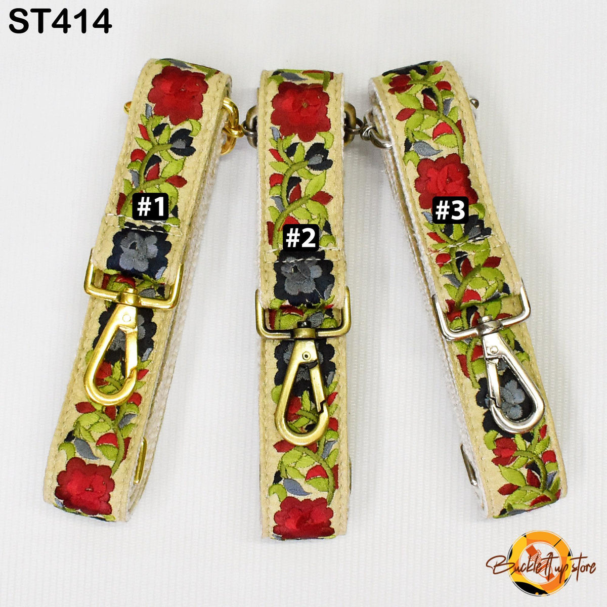 Three floral-patterned straps with metal clasps, each with a different number printed on it.