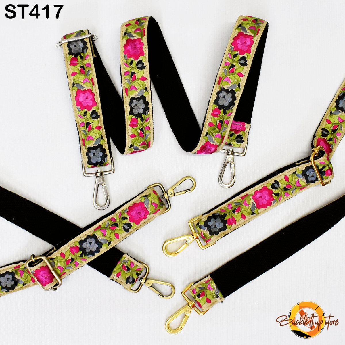 a collection of colorful floral-patterned straps, including black straps with gold and pink floral designs, arranged on a white background.