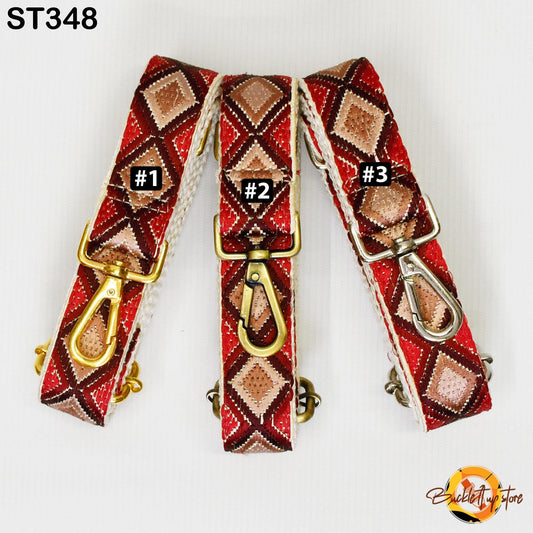 Three colorful straps with gold and red diamond patterns, each with a metal clasp and hook.