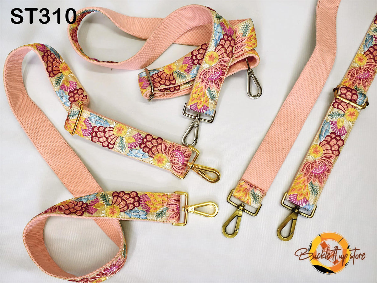 a collection of colorful floral straps, including pink and yellow straps with various patterns, arranged on a white background.