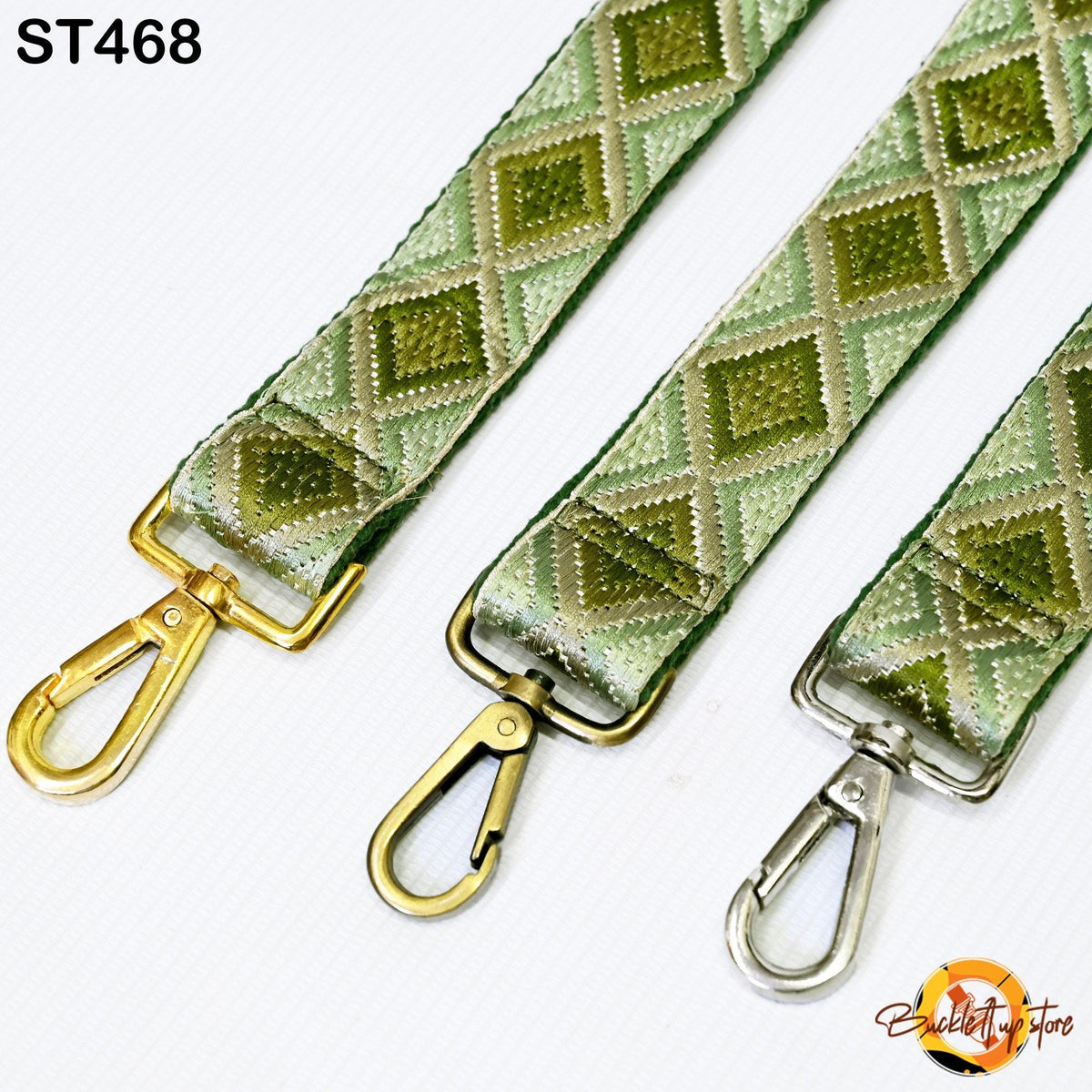 three colorful straps with metal hooks, arranged side by side.