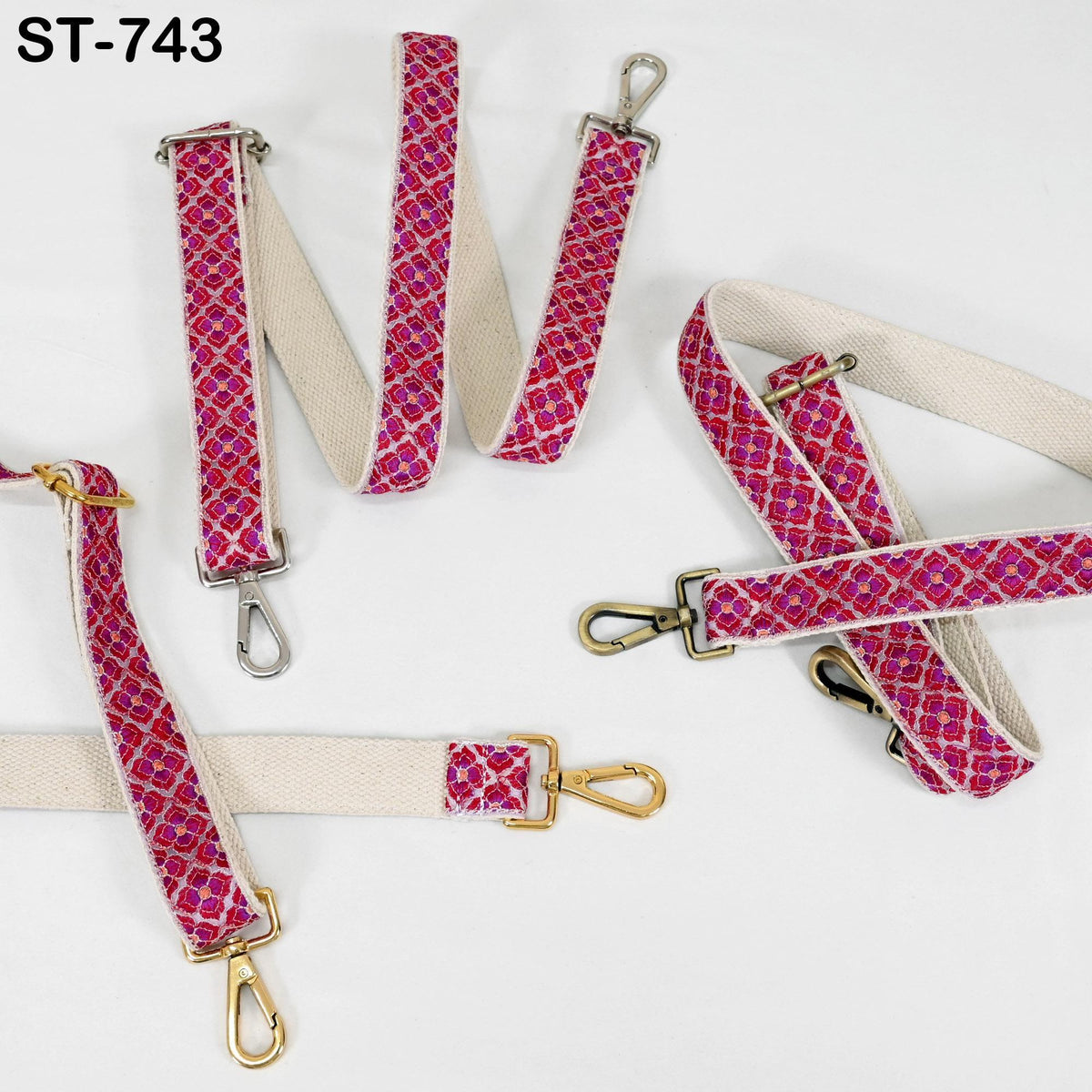 a collection of colorful straps with a pink and white pattern, arranged on a white background.