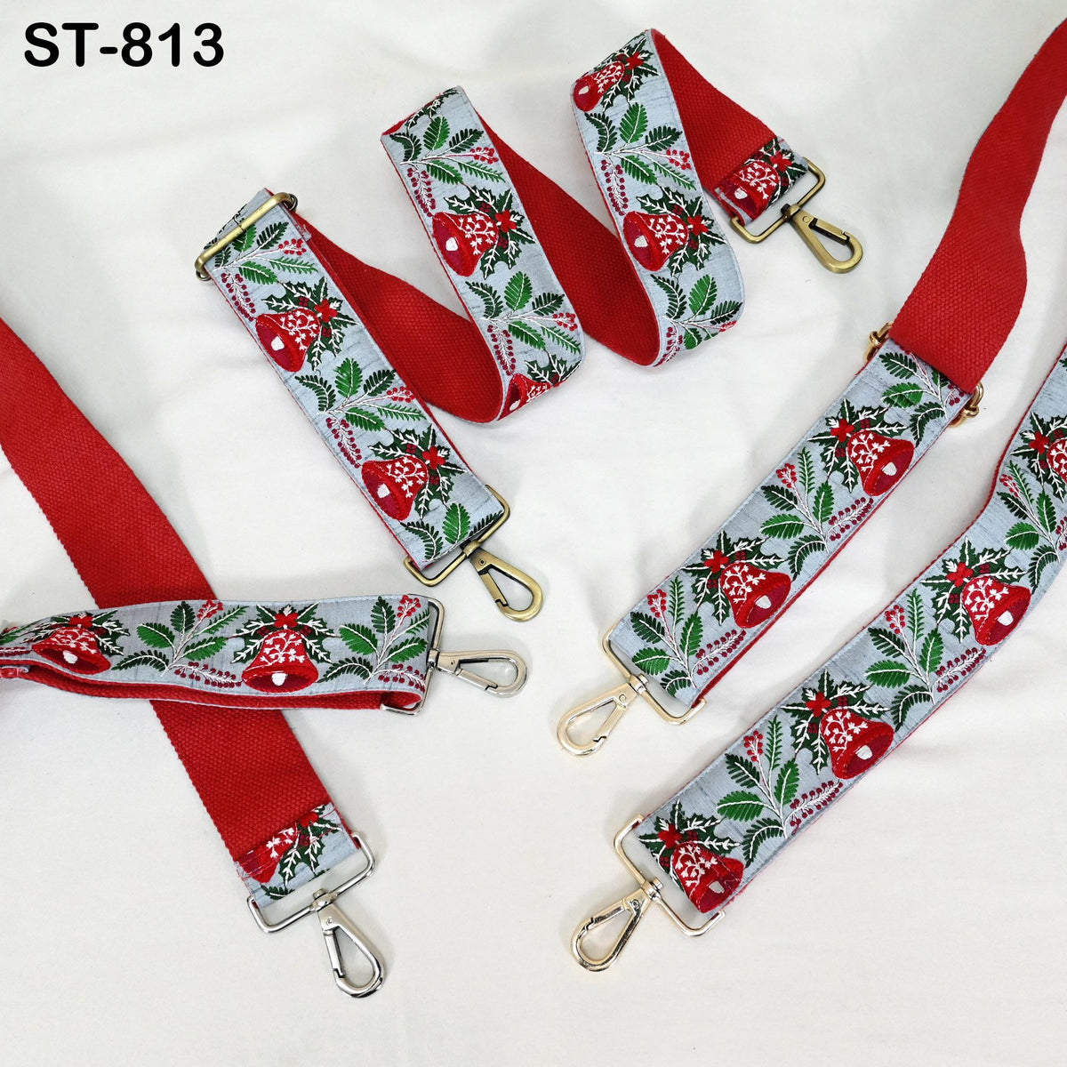 a collection of red and gray straps with floral patterns, arranged on a white background.