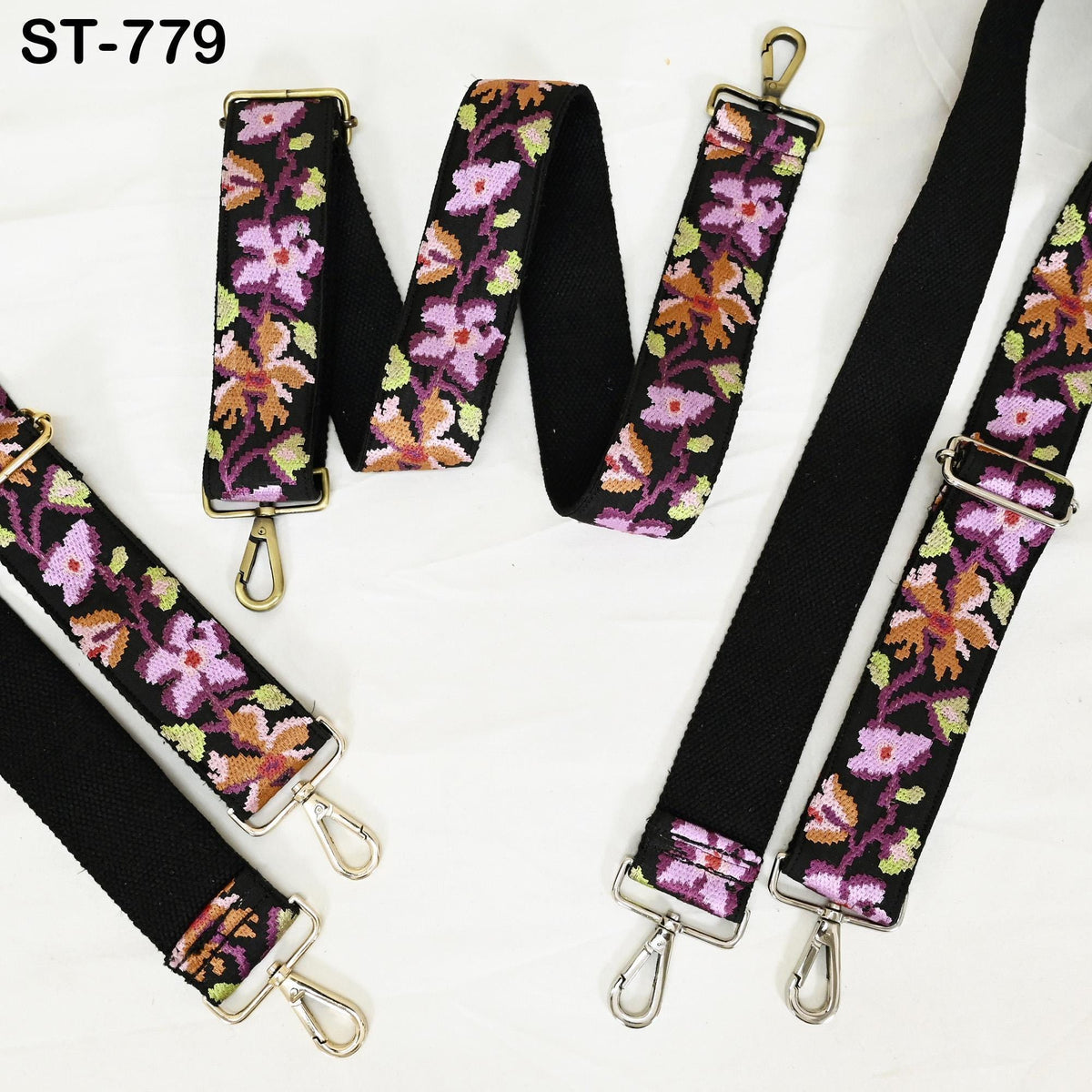 a collection of colorful floral straps and suspenders, arranged on a white background.