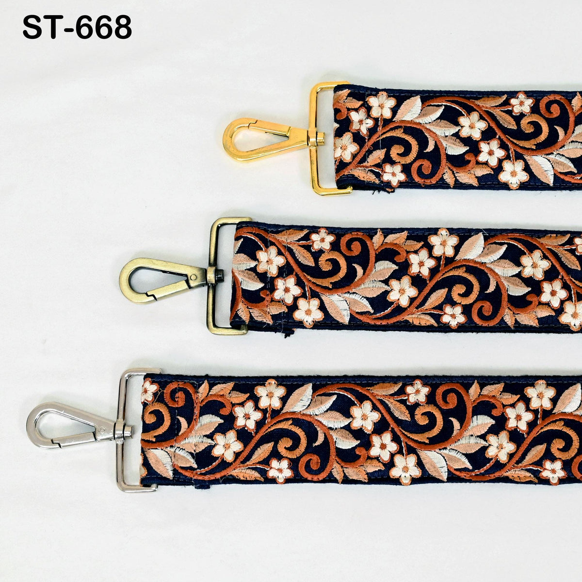 three straps with floral embroidery patterns in different colors, including black, gold, and silver.