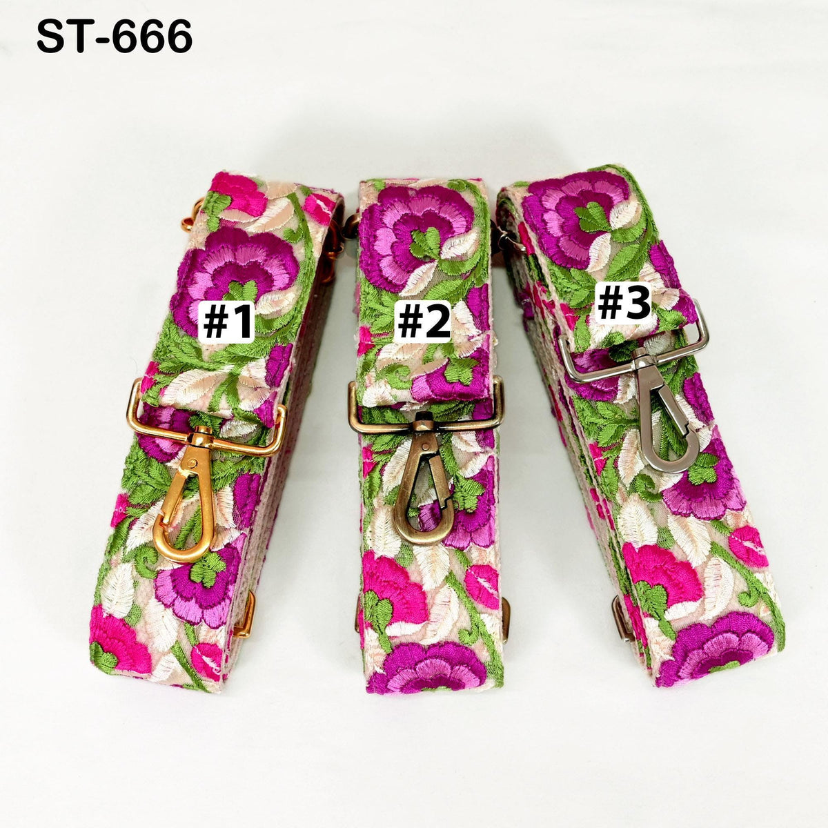 Three colorful floral straps with numbers on them, placed side by side.