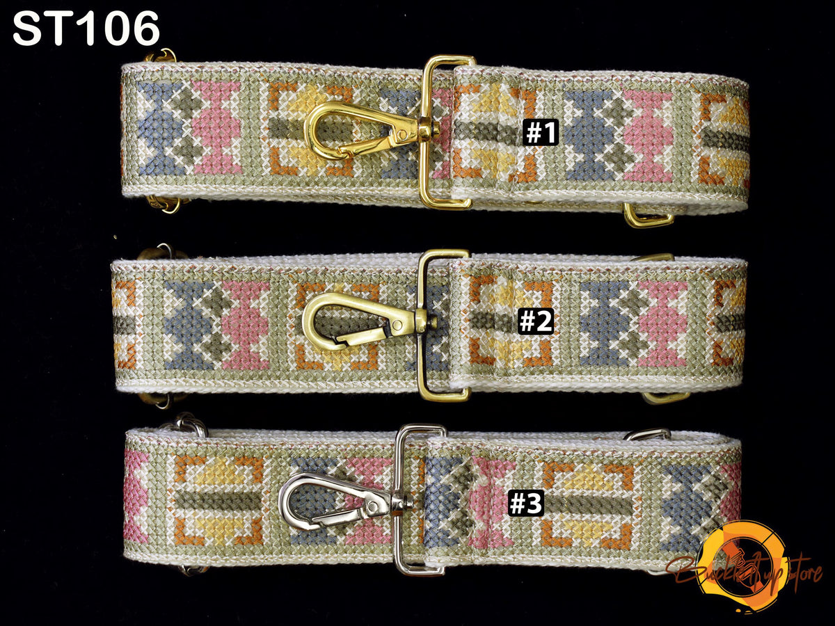 three colorful, patterned straps with metal buckles, each with a unique number printed on it.