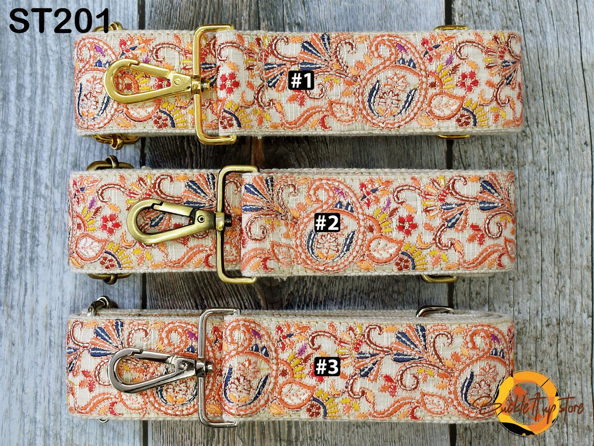three different straps with a floral pattern, each with a unique number printed on it.