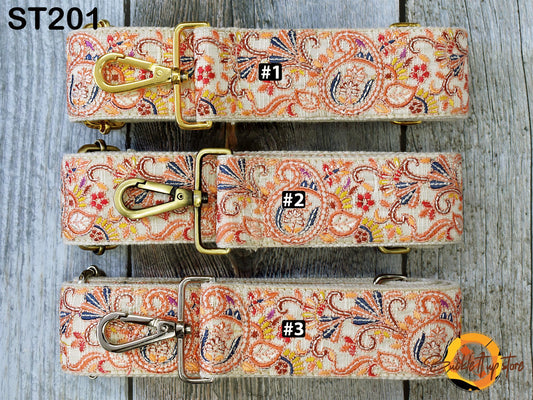 three different straps with a floral pattern, each with a unique number printed on it.