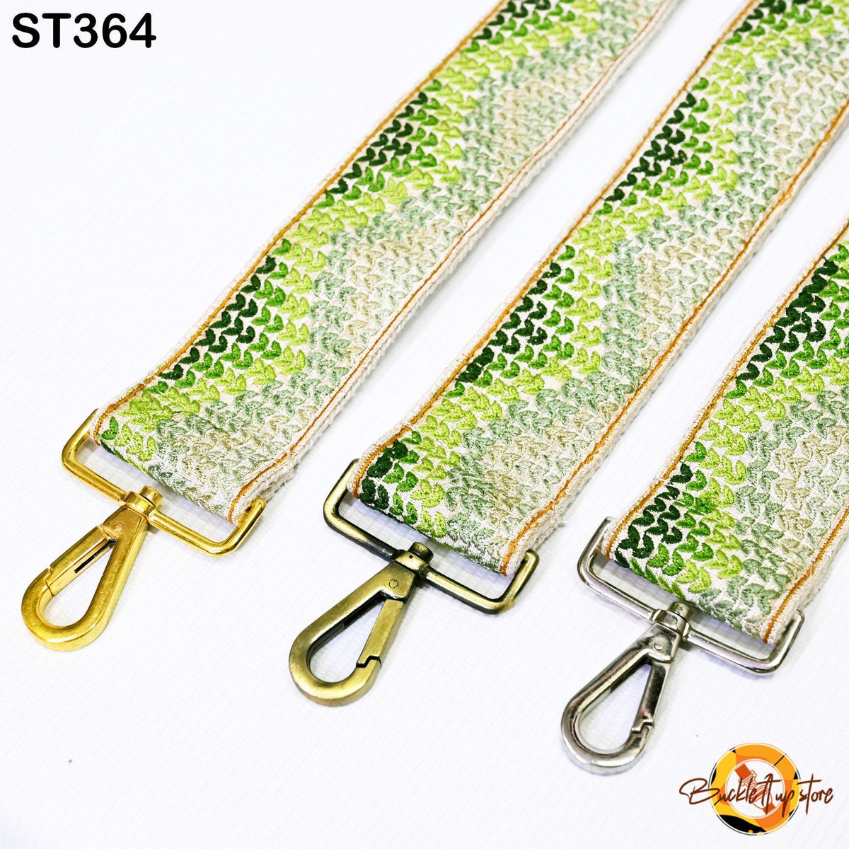 three colorful straps with metal hooks, arranged side by side.