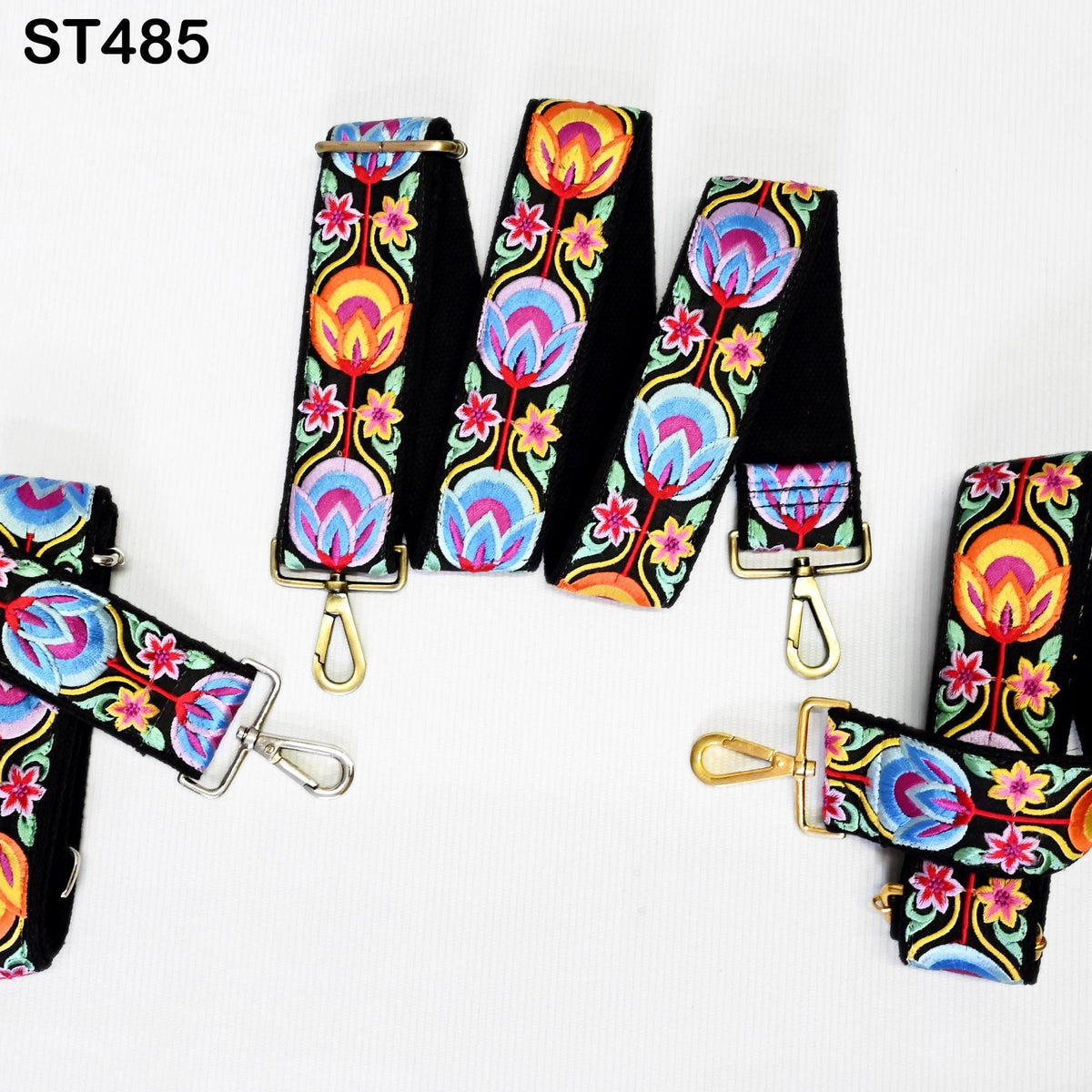 a collection of colorful, patterned straps with floral designs, arranged on a white background.
