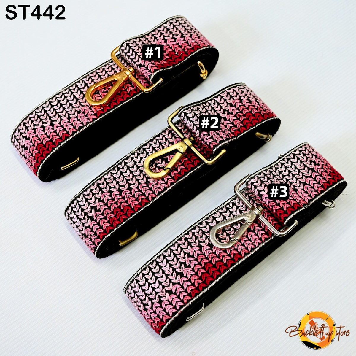 three colorful straps with different patterns, arranged in a row.