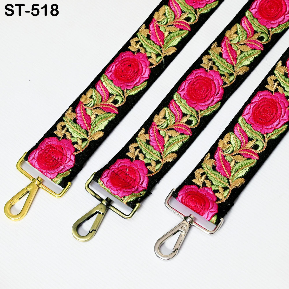 three colorful straps with floral embroidery, each featuring a gold-colored metal clasp.