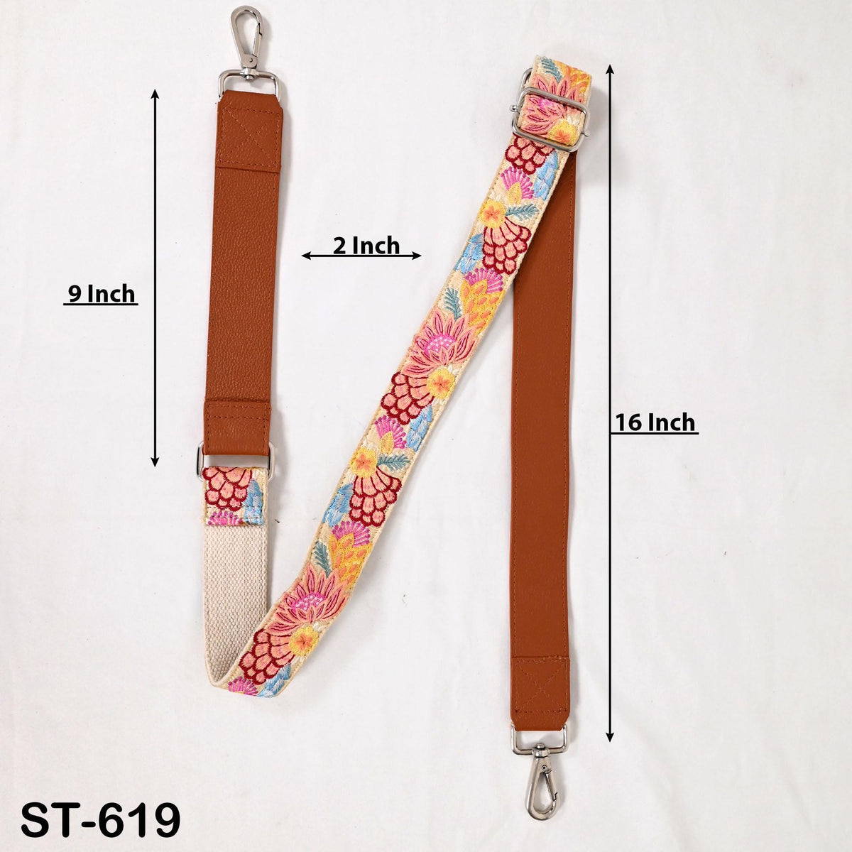 a strap with a floral pattern, measuring 9 inches in length and 16 inches in width.