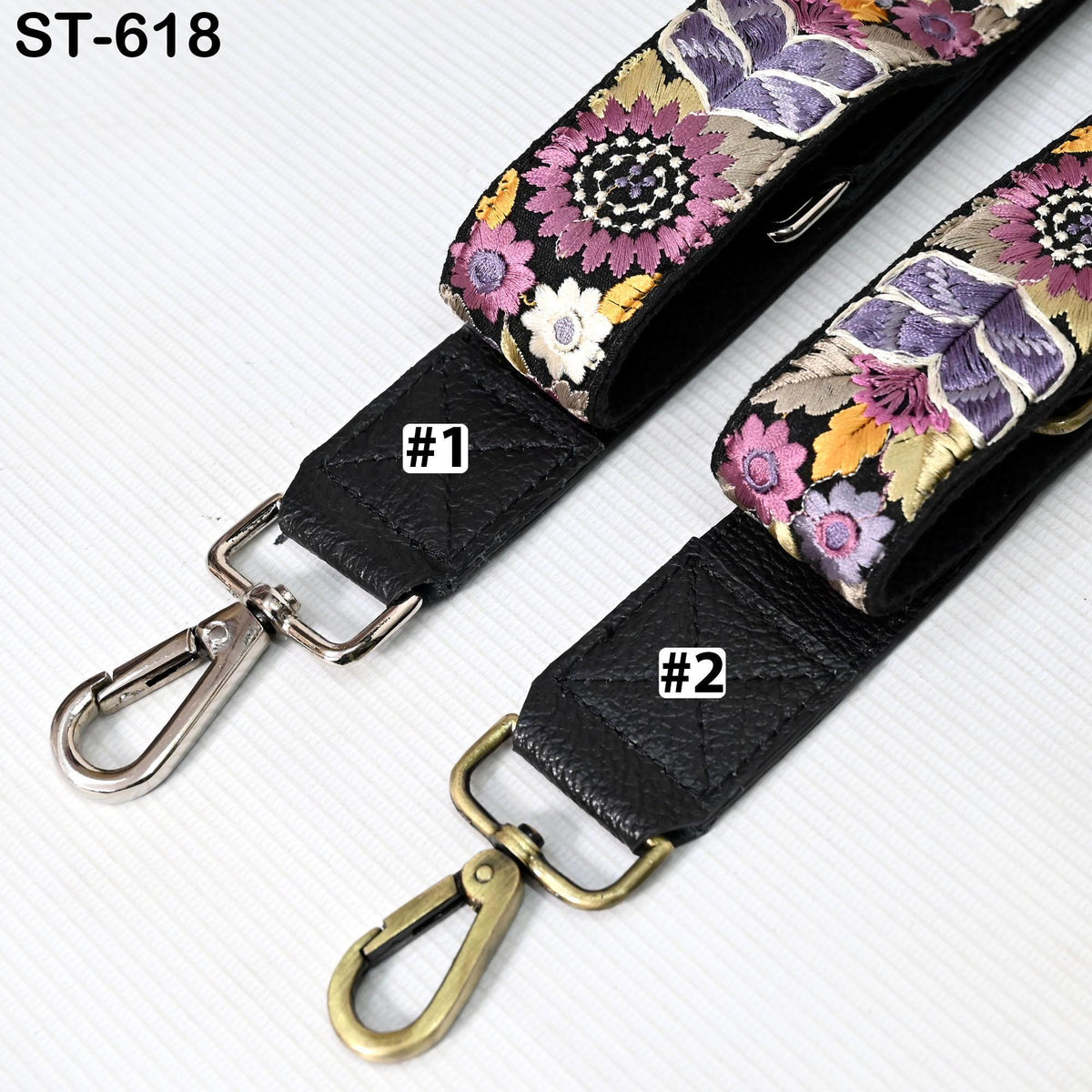 two colorful straps with floral patterns, one with a black strap and the other with a gold strap.