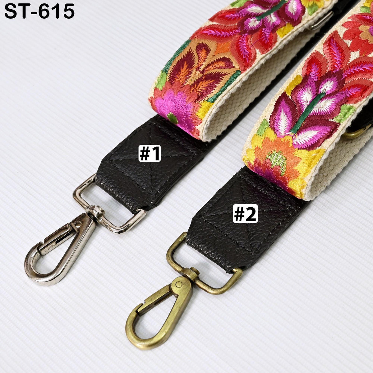 two colorful straps with floral patterns, one with a black leather strap and the other with a gold-colored leather strap.