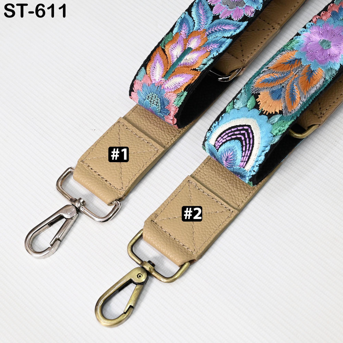 two colorful straps with floral patterns, one with a metal hook and the other with a metal loop.