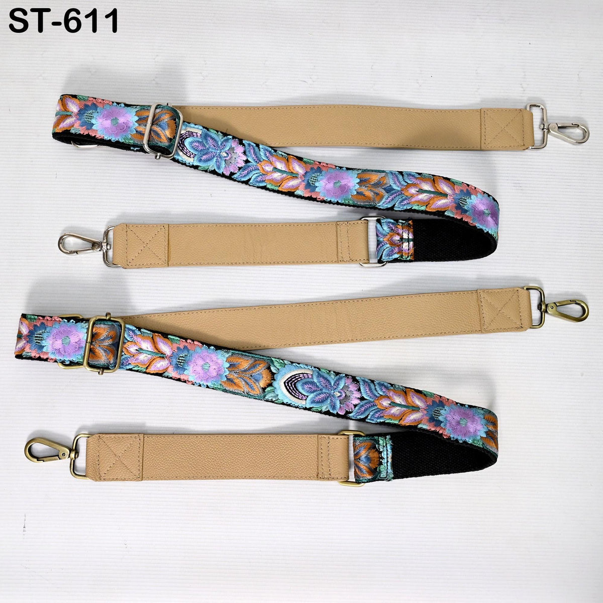 a set of colorful, patterned straps with floral designs, arranged on a white background.