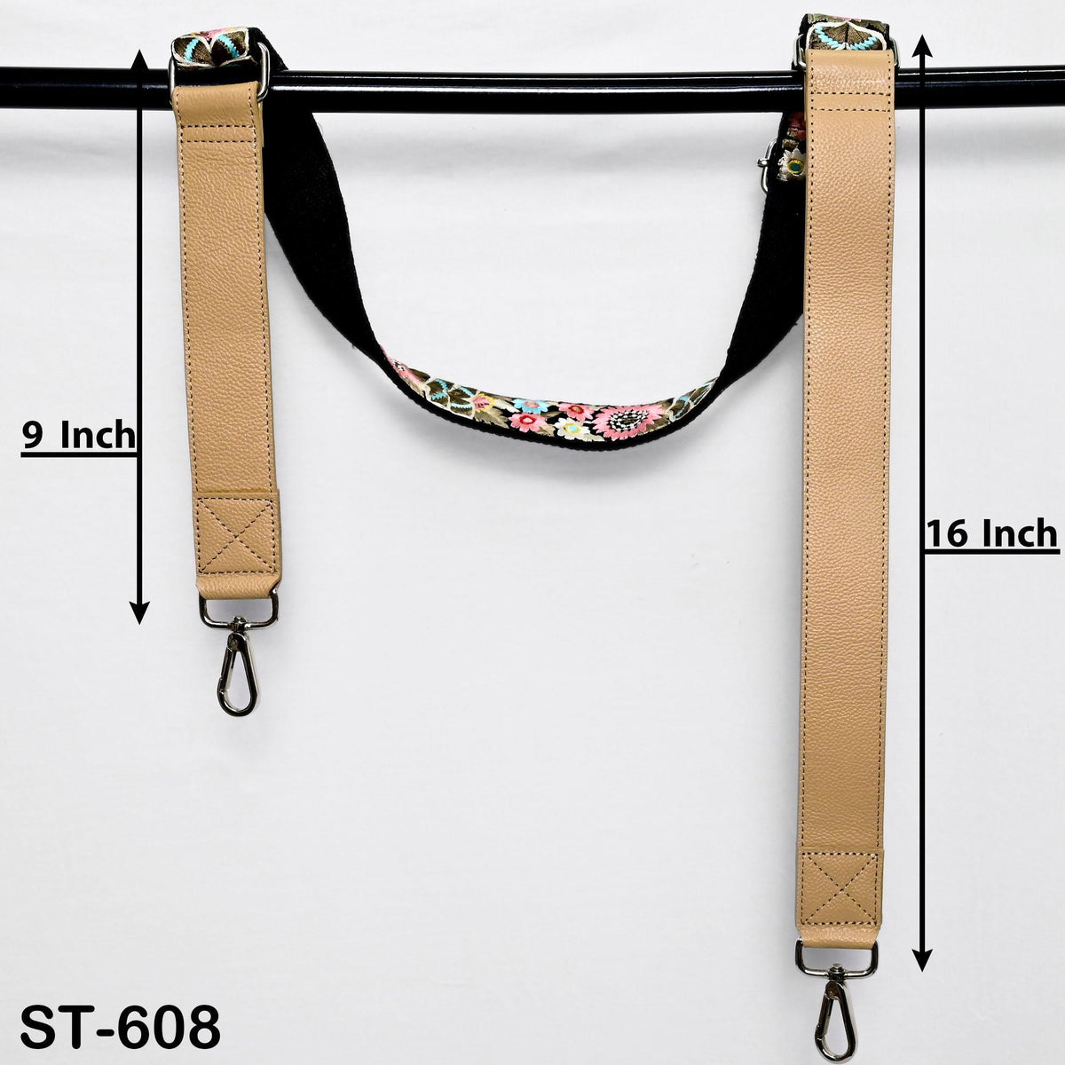 two tan leather straps with metal hooks, hanging on a black bar. The straps are labeled with measurements in inches, indicating they are 9 inches and 16 inches long.