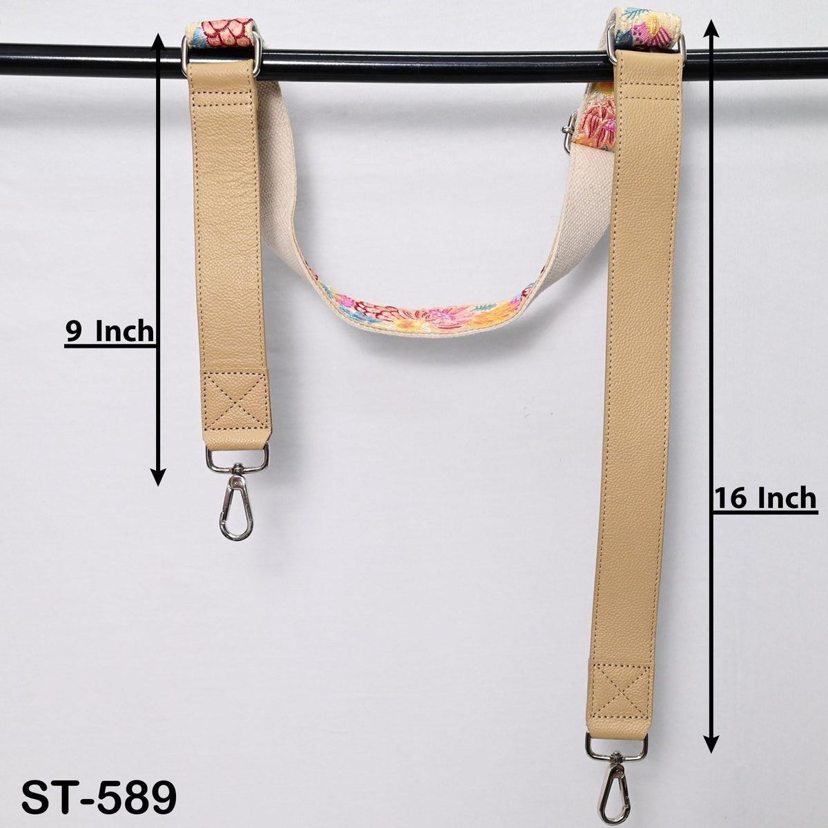 two beige straps with metal hooks attached, hanging on a black bar. The straps are labeled with their respective measurements, indicating that one strap is 9 inches long and the other is 16 inches long.