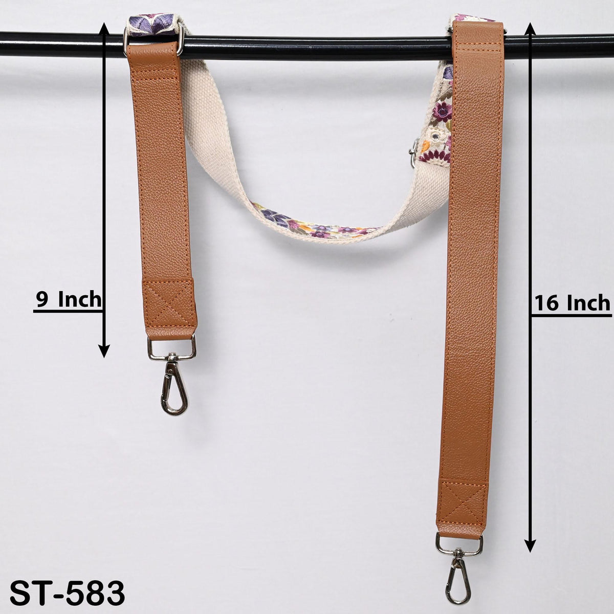two leather straps hanging on a black bar, with measurements provided.