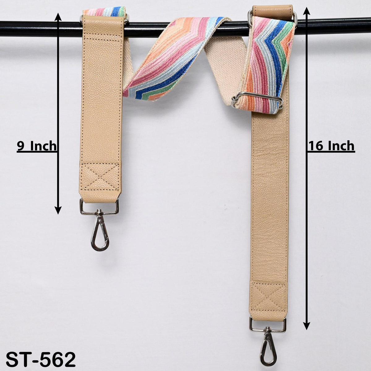 two beige leather straps with colorful stripes hanging from a black bar. The straps are labeled with measurements, indicating they are 9 inches and 16 inches long.