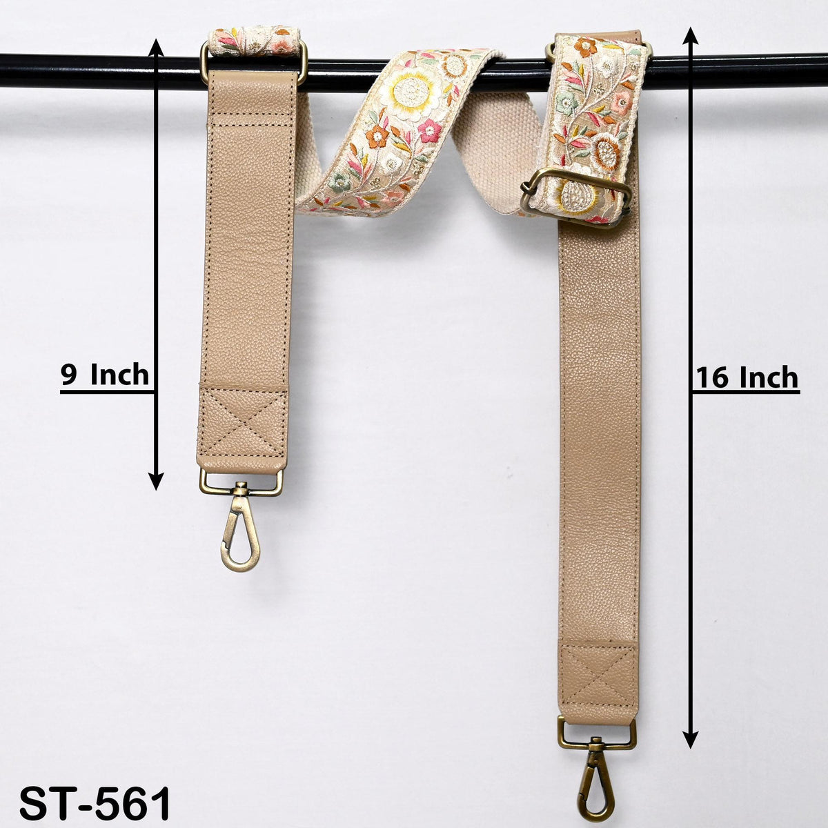 two beige straps with floral patterns, each with a metal hook at the end. The straps are hanging on a black bar, and there are measurements provided for each strap.