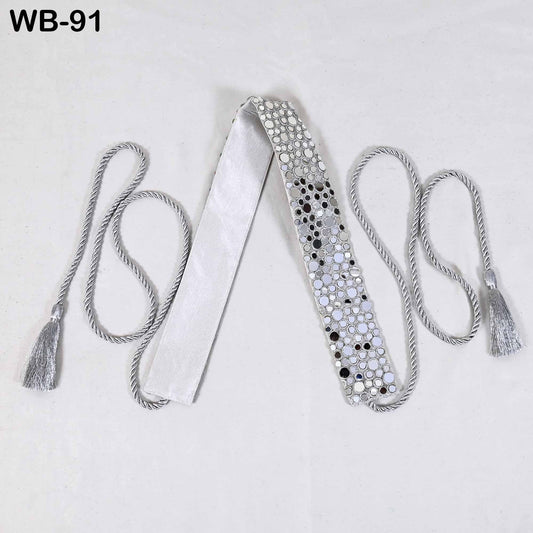 a white tie with silver rhinestones or crystals on it, along with two gray tassels or strings attached to it.