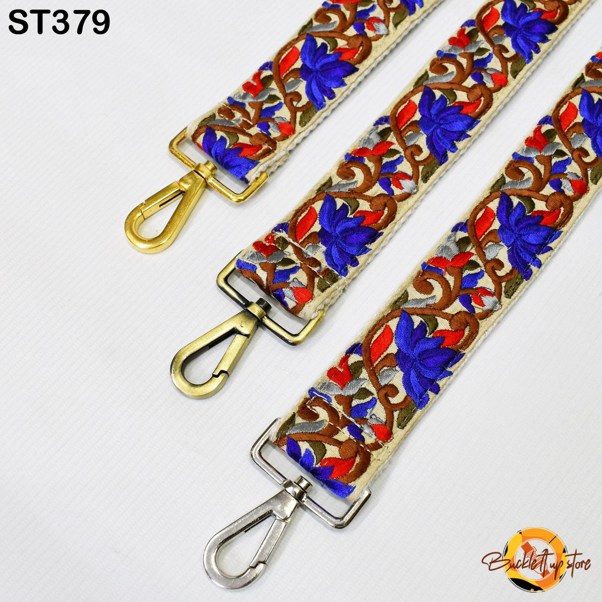 three colorful straps with floral patterns, each featuring a metal clasp and hook.