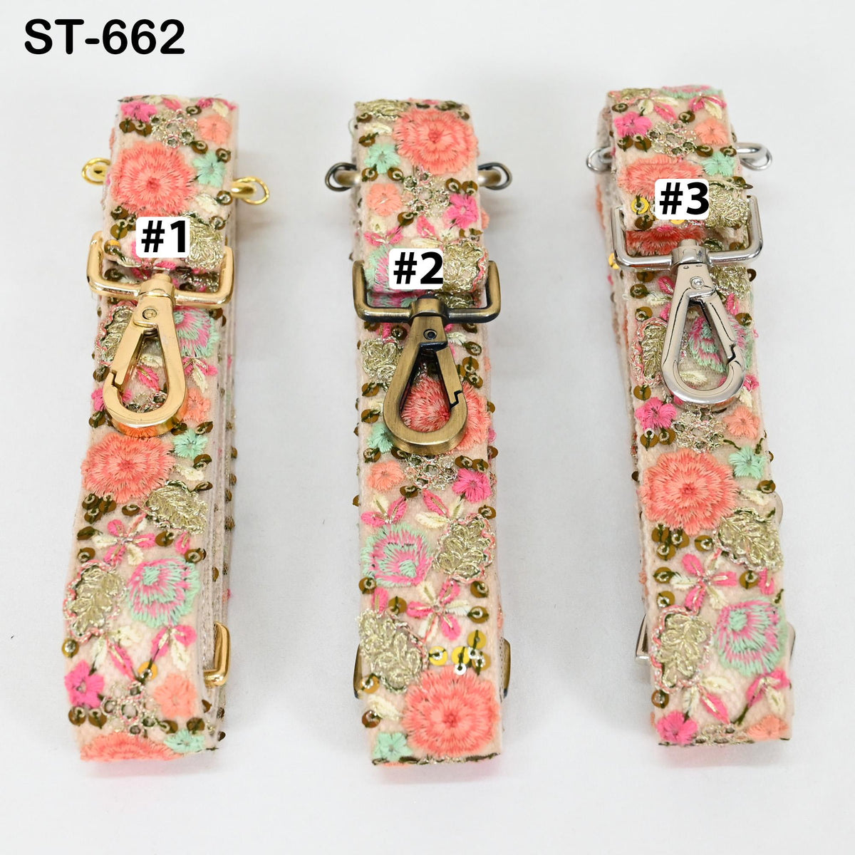 Three floral straps with numbers attached to them, each with a different color and design.