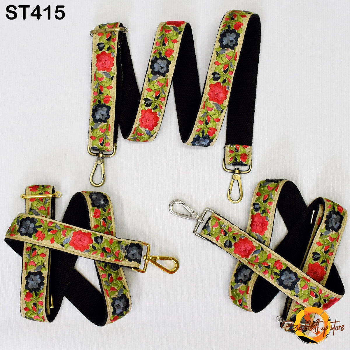 a collection of colorful floral-patterned straps, including a black strap with a gold clasp and a red strap with a gold clasp.