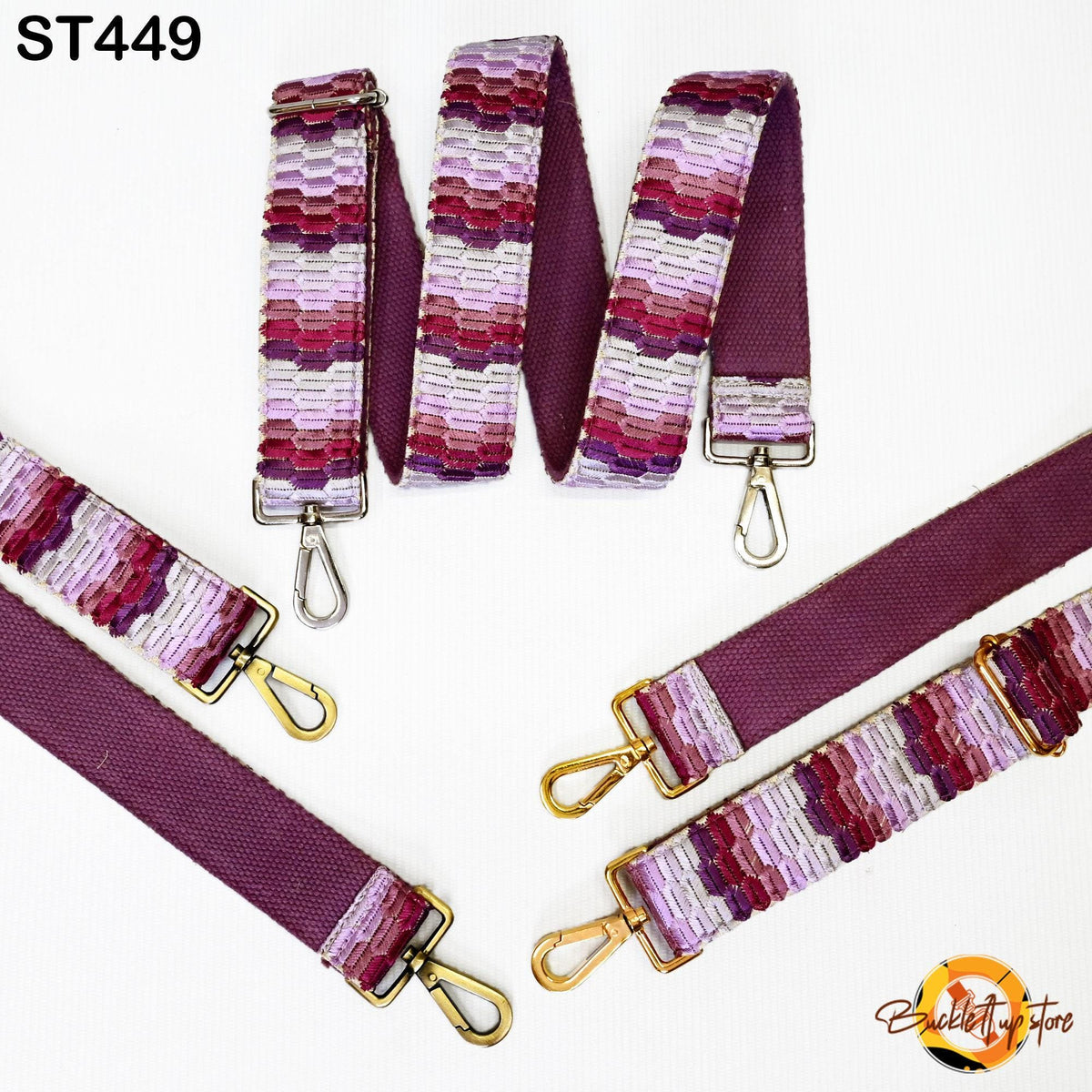 a collection of colorful, patterned straps in shades of purple and pink, arranged on a white background.