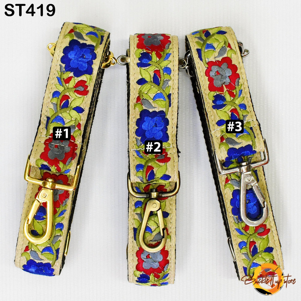 Three colorful straps with floral patterns, each with a metal clasp and hook.