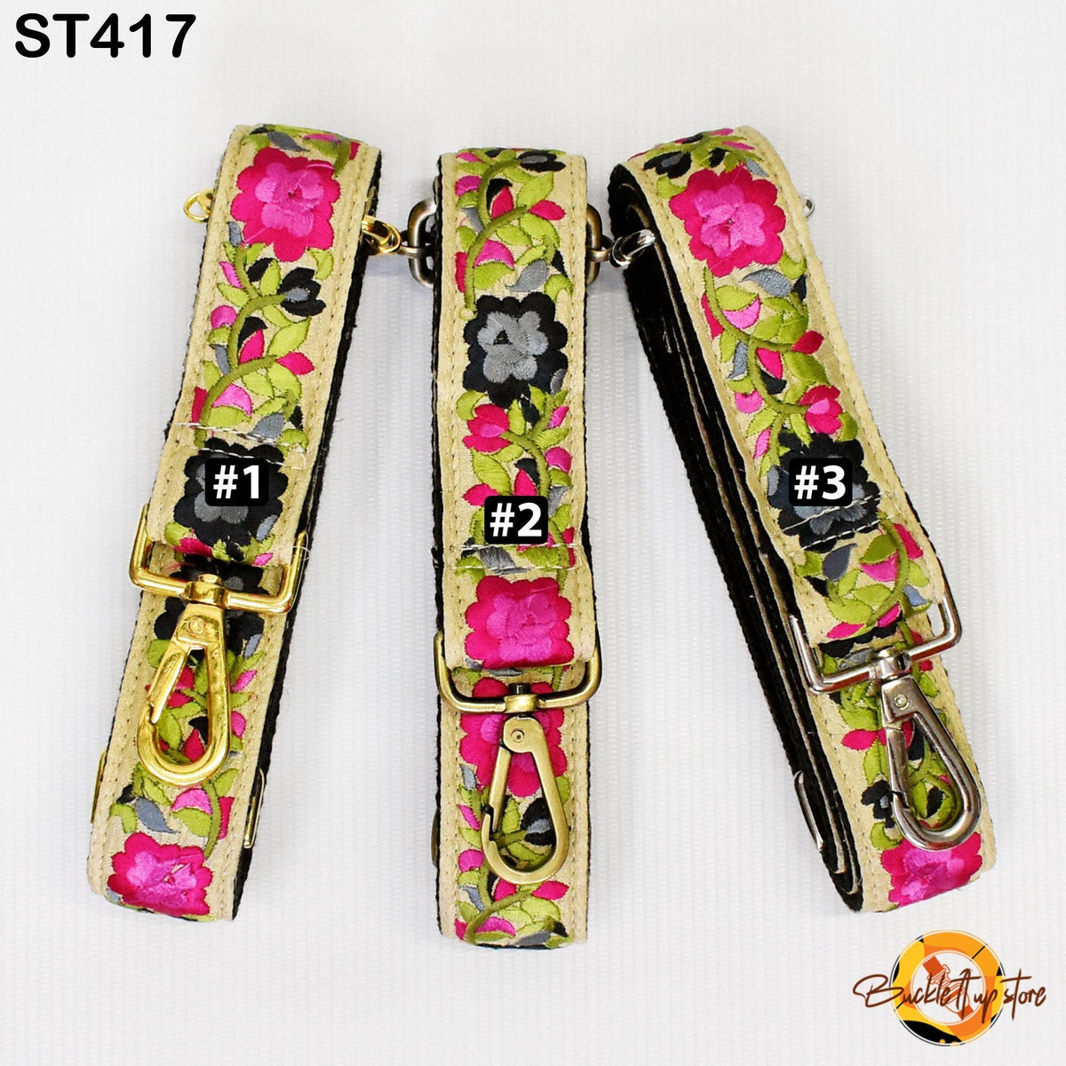 Three floral-patterned straps with numbers 1, 2, and 3 attached to them, suggesting they are part of a collection or set.