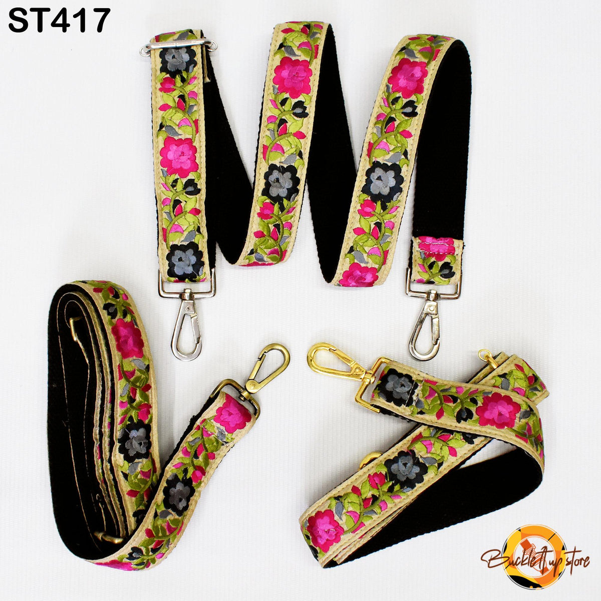 a collection of colorful floral-patterned straps and buckles, including a black strap with a floral pattern and a pink strap with a floral pattern.