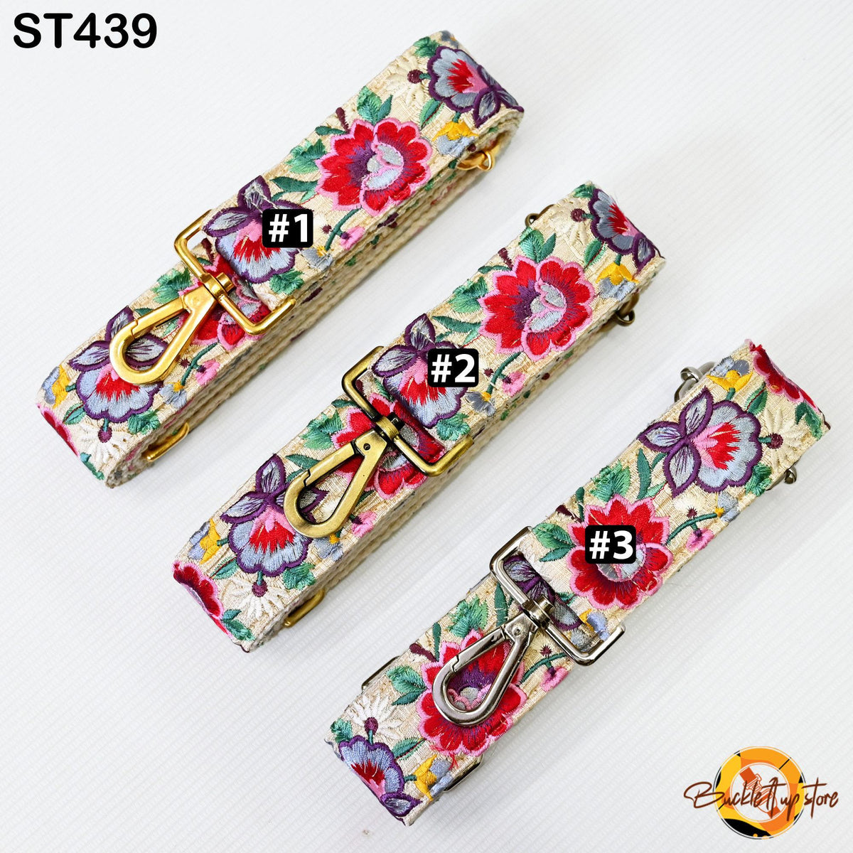 three colorful floral straps with numbers 1, 2, and 3 printed on them, arranged in a row.