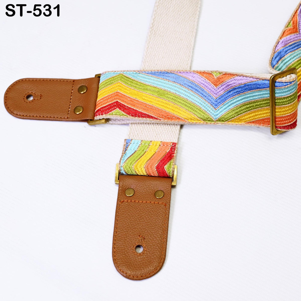 A colorful strap with a buckle and leather buckle is shown in the image.