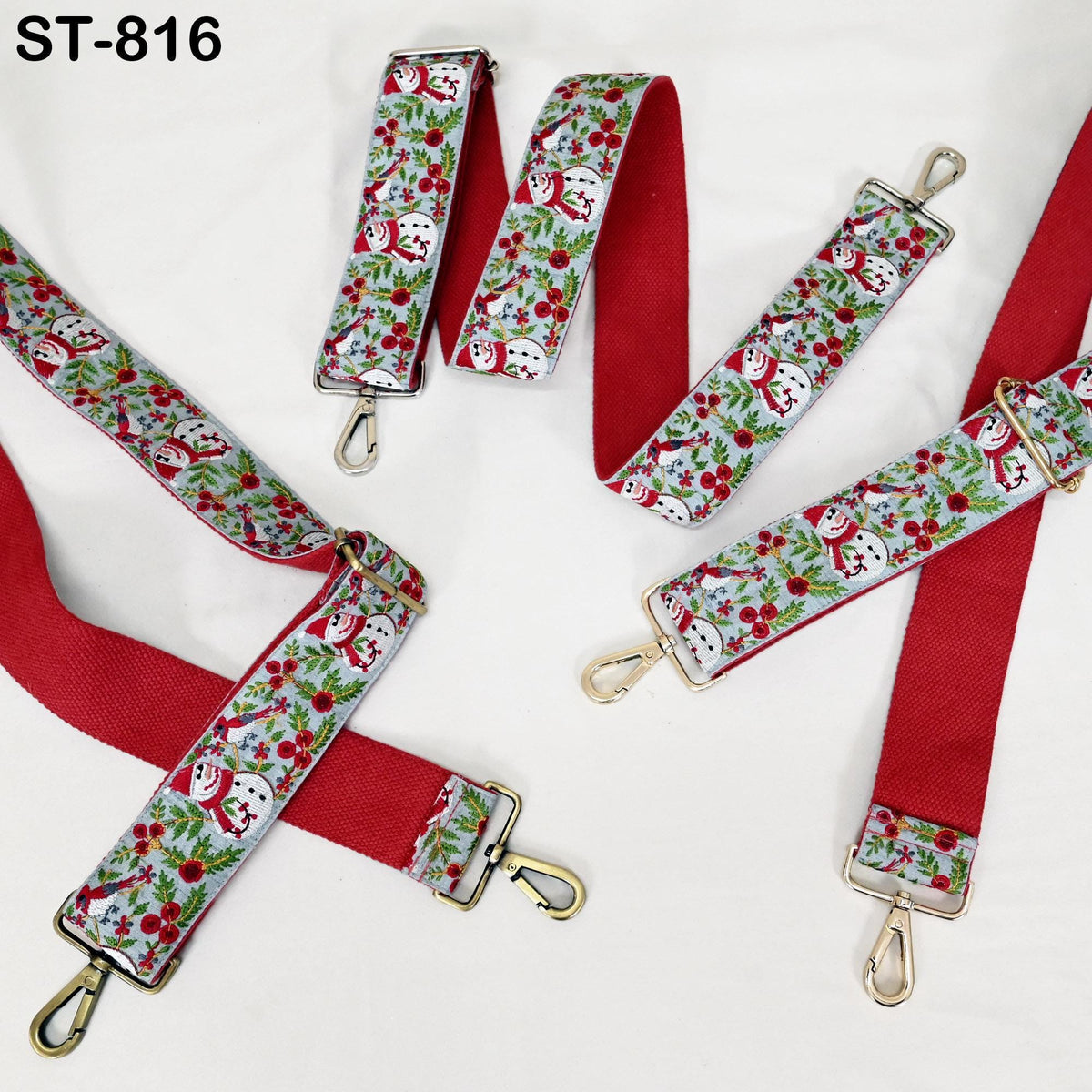 a collection of red and white straps with a floral pattern, arranged on a white background.